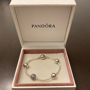 Pandora essence bracelet with charms
